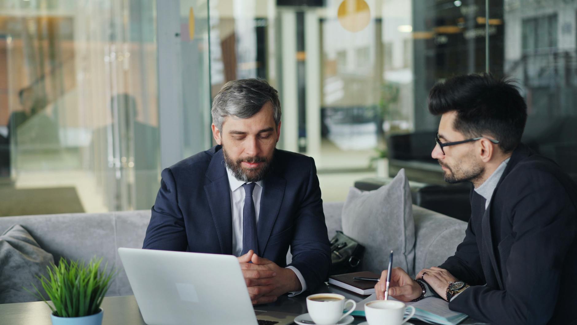 DataThetics Consulting executives in strategic discussion